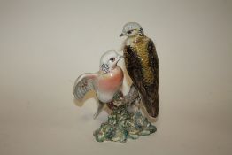 A BESWICK FIGURE OF TWO BIRDS ON A BRANCH MODEL 1022