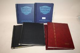 TWO THE SENATOR MEDIUM STAMP ALBUMS CONTAINING WORLD STAMPS, TOGETHER WITH TWO QUICK CHANGE STAMP