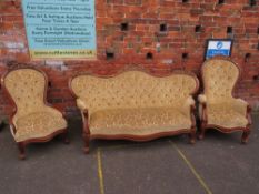 A MAHOGANY FRAMED UPHOLSTERED SCROLL ARM SETTEE AND TWO CHAIRS