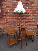 AN OAK STANDARD LAMP, TWO OCCASIONAL TABLES AND A JARDINAIRE STAND (4)