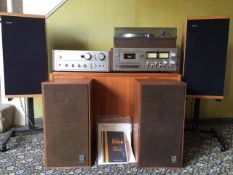 A SONY TUNER AMPLIFIER CASSETTE DECK AND RECORD PLAYER TOGETHER WITH A PAIR OF BMW SPEAKERS ON