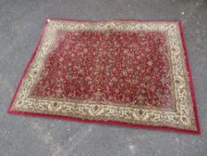 A MODERN WOOLLEN CARPET / RUG 170 X 117 CM