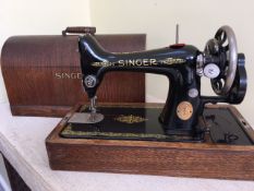 A VINTAGE SINGER SEWING MACHINE