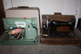 A CASED VINTAGE SINGER ELECTRIC SEWING MACHINE TOGETHER WITH AN UNCASED EXAMPLE