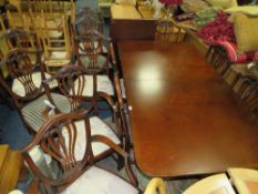 A REPRODUCTION MAHOGANY TWIN PEDESTAL DINING TABLE WITH TWO SPAR LEAVES AND TWELVE CHAIRS