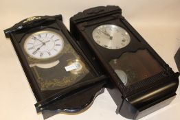 TWO WALL CLOCKS, TO INCLUDE A PLASTIC EXAMPLE