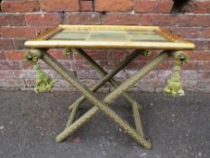 AN UNUSUAL GILT AND GLAZED TWIN HANDLED BUTLERS TRAY ON STAND