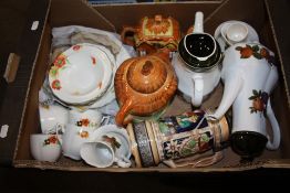A TRAY OF ASSORTED CHINA TO INCLUDE TEA AND COFFEE POTS