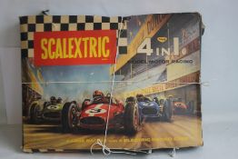 A BOXED LATE 1960S SCALEXTRIC SET, FOUR LANE, with 4 cars , instructions