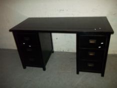 A MODERN TWIN PEDESTAL DESK