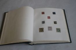 AN ALBUM OF MAINLY BRITISH STAMPS, to include a Penny Black and two imperf twopenny blues etc