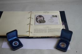 QUEEN MOTHER INTEREST - TWO SILVER PROOF COOK ISLANDS COLOURIZED DOLLARS, 2000, AND 2002, together