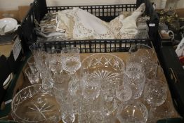 A TRAY OF GLASSWARE TOGETHER WITH A TRAY OF LINEN (trays not included)