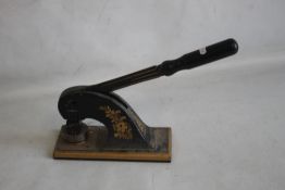 A LARGE VICTORIAN CAST IRON COMPANY HAND OPERATED PRESS