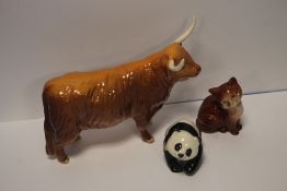 A BESWICK BULL together with a Beswick panda and a Beswick cat (3)