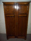 AN OAK WARDROBE