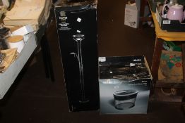 A BOXED TEN SHEET CROSS CUT SHREDDER and a boxed oil filled radiator