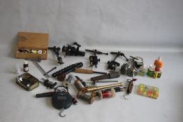 A COLLECTION OF FLY FISHING ACCESSORIES to include scales, priests, fly tiers, two reels etc.