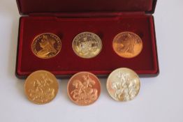 A QUEEN VICTORIA RETRO PATTERN CROWN SET, 1879, ONE IN SILVER AND TWO IN COPPER, together with an