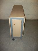 A MODERN FOLD AWAY DROP LEAF DINING TABLE WITH FOLD AWAY CHAIRS