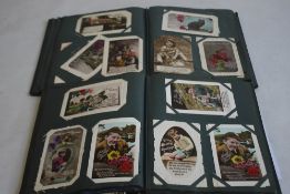 TWO EDWARDIAN ALBUMS OF POSTCARDS, mainly greetings types