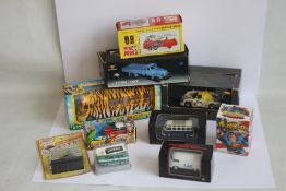 A COLLECTION OF TEN BOXED CHINESE VEHICLES to include Fuji Safari Park Truck, JIE Fang Truck, Arnage