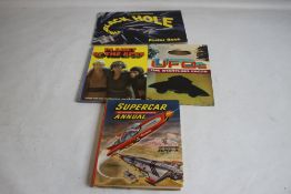 WALT DISNEY PRODUCTIONS' BLACK HOLE POSTER BOOK 1979 together with 'UFOs The Startling Facts' and '