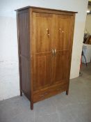 A MODERN TWO DOOR WARDROBE WITH DRAWER