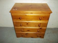 A PINE CHEST OF FOUR DRAWERS