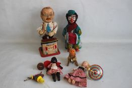 A 1950S/1960S JAPANESE AUTOMATON TOYS CONSISTING OF A MUSIC PLAYING HOBO AND MONKEY, and a Charles