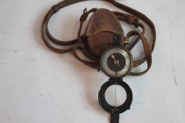 A WWI MARCHING COMPASS, DATED 1918 in fitted leather case