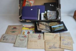 FOUR ALBUMS OF ASSORTED POSTCARDS to include a good selection of churches along with a selection