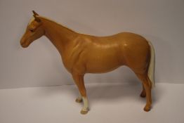 A BESWICK PALOMINO HORSE