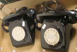 A PAIR OF VINTAGE BLACK DIAL TELEPHONES