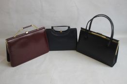 A VINTAGE EROS RED LEATHER HANDBAG together with a black Ackery leather handbag and a navy blue