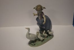 A LLADRO FIGURE GROUP of a girl and geese