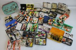 A LARGE QUANTITY OF ASSORTED FISHING FLIES in cases