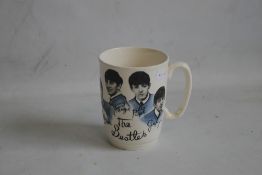 THE BEATLES, 1960S CHINA MUG, with portraits of the group and printed signatures