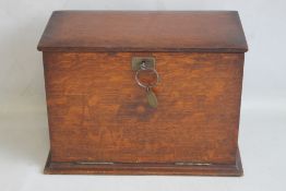 A SMALL FALL FRONT DESKTOP CABINET, with fitted interior