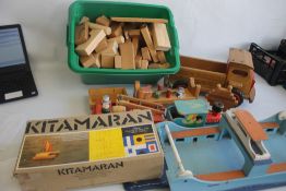 A QUANTITY OF WOODEN TOYS to include a boxed Kitmaran model, large vintage ferry, home built trucks,