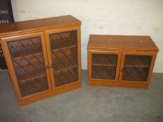 A MODERN TEAK WALL DISPLAY UNIT