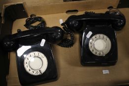 A PAIR OF VINTAGE BLACK DIAL TELEPHONES