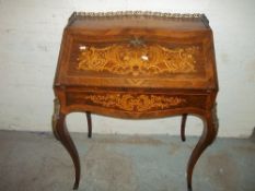 A LOUIS XV STYLE WRITING DESK WITH BROKEN LOCK
