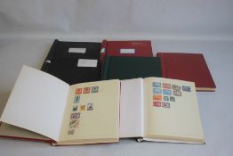 SEVEN ALBUMS OF BRITISH AND WORLD STAMPS, mostly 20th Century