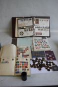 TWO ALBUMS OF BRITISH AND WORLD STAMPS IN ALBUMS AND ON COVERS, together with a small quantity of