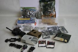 A BOX OF ASSORTED METAL AND PLASTIC SOLDIERS to include metal Star Wars figures, boxed Mig 25