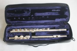 A TREVOR JAMES FLUTE TJ X10, in fitted carry case