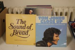 A BOX OF RECORDS TO INCLUDE BREAD, TOM JONES, JIMMY HELMS, JIMMY RUFFIN ETC.