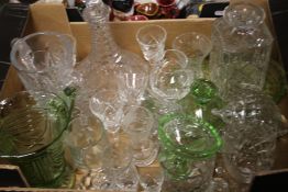 A TRAY OF GLASSWARE to include decanters, part dressing table set etc. (tray not included)