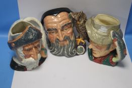 THREE ROYAL DOULTON CHARACTER JUGS to include The Poacher, Merlin and Don Quixote (3)